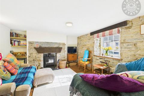 undefined, “An attractive four bedroom cottage boasting a substantial 0.06 acre plot and impressive rear garden.”