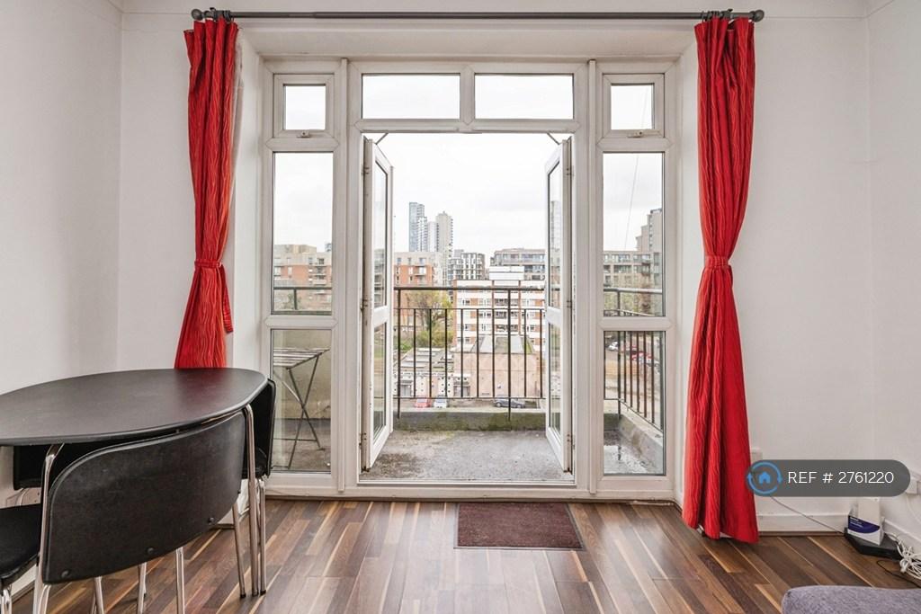 Living Room.  Balcony Doors.