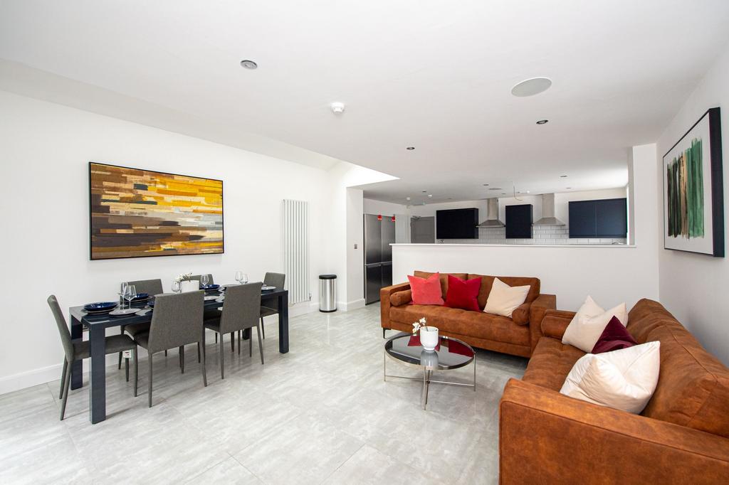 Spacious and modern living room with ample seat...