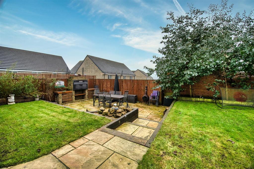 Rear Garden - lower patio and BBQ oven.jpg