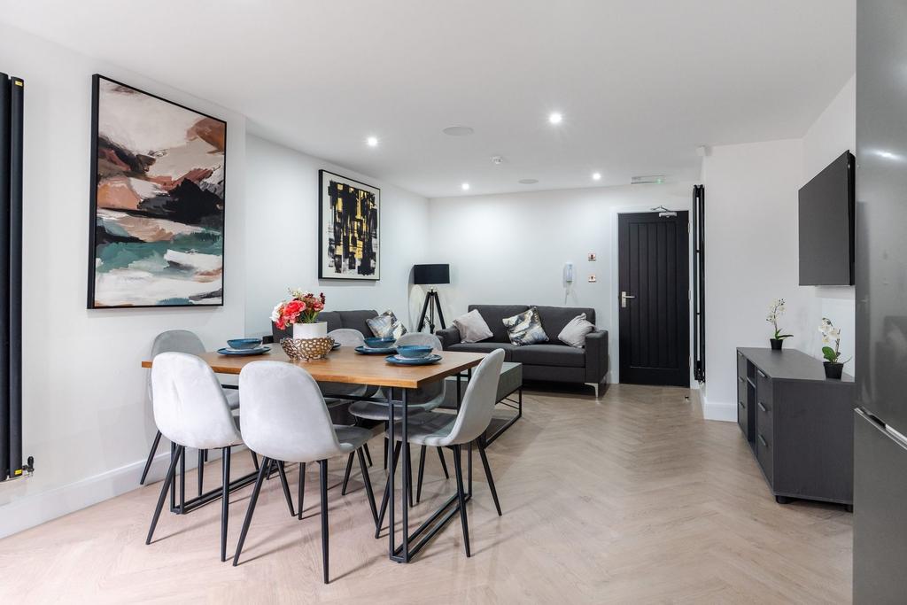 A stylish, well-lit living room featuring moder...