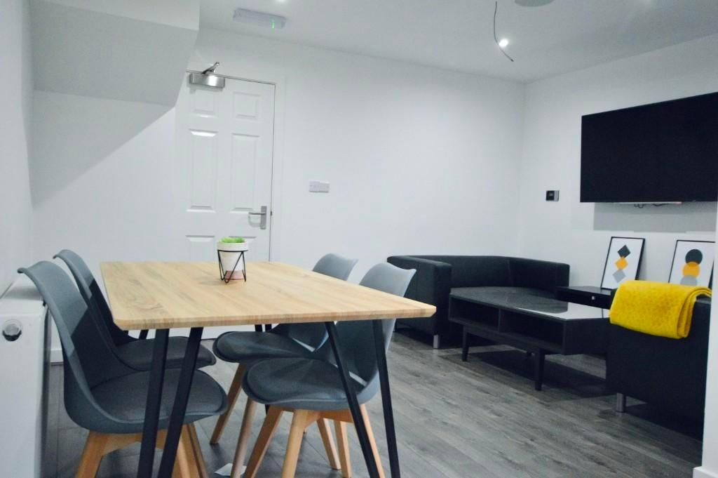 A modern and well-maintained living room with s...