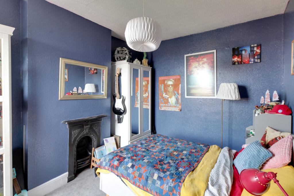 Large Double Bedroom  with feature fireplace