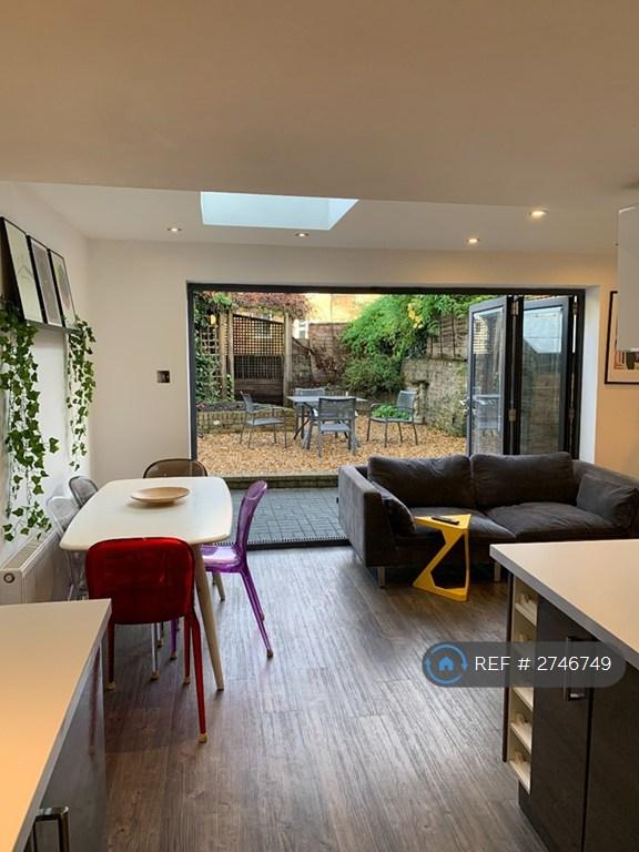 Bright Dining Space With Skylights