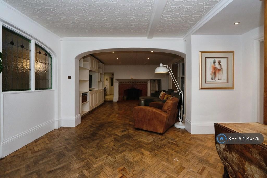 Entrance Area And View Into Family Room