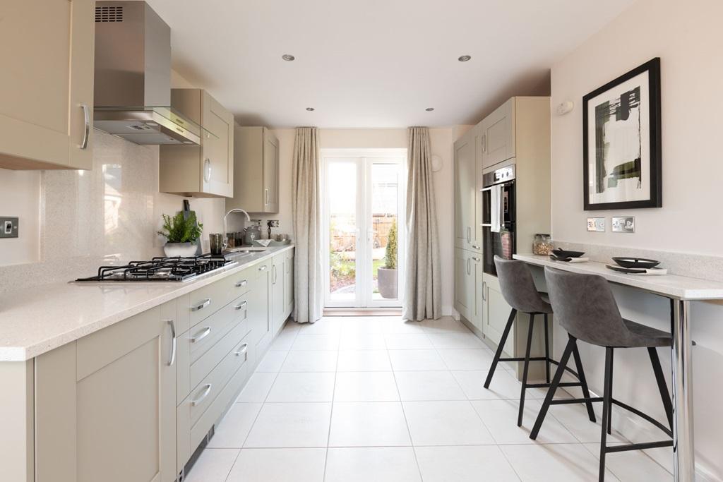 Enjoy preparing meals with french doors open to...