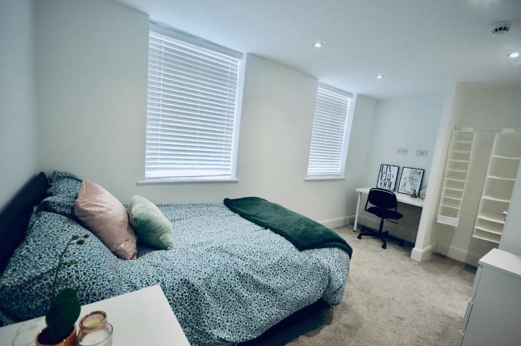 A beautifully presented double bedroom featurin...