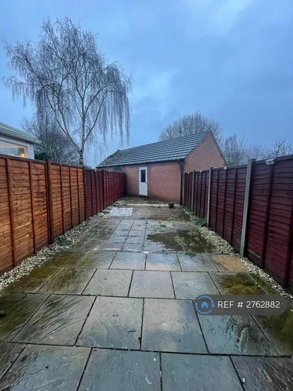 Back Garden Leading To Garage