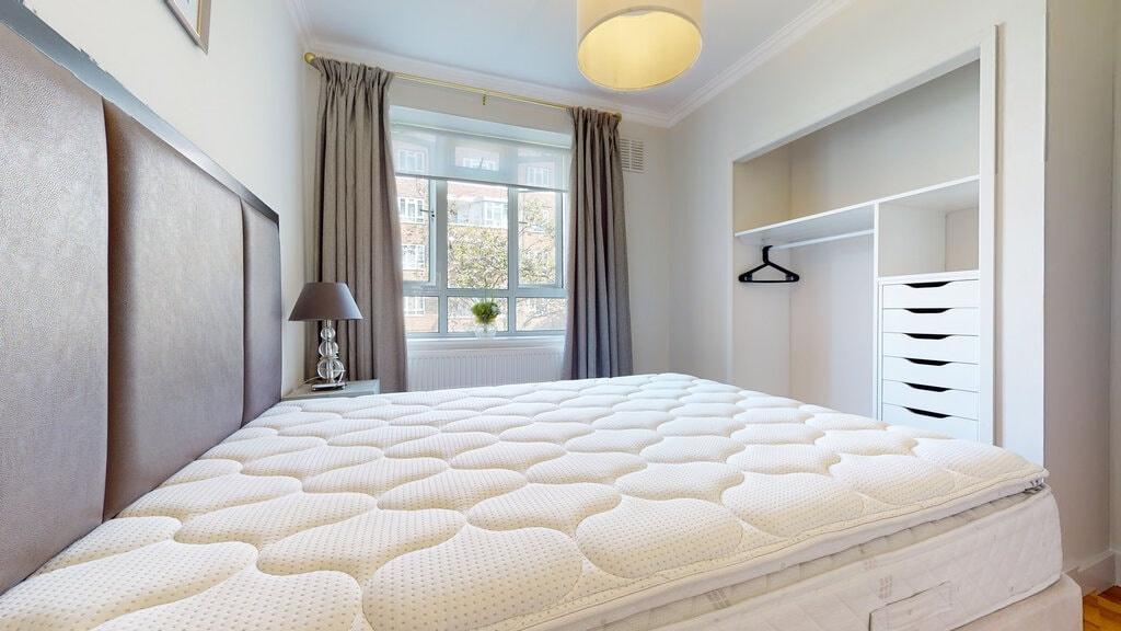 Bright, neatly presented double bedroom with a ...