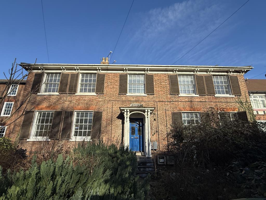 Front View of Period House Arranged as Four Flats
