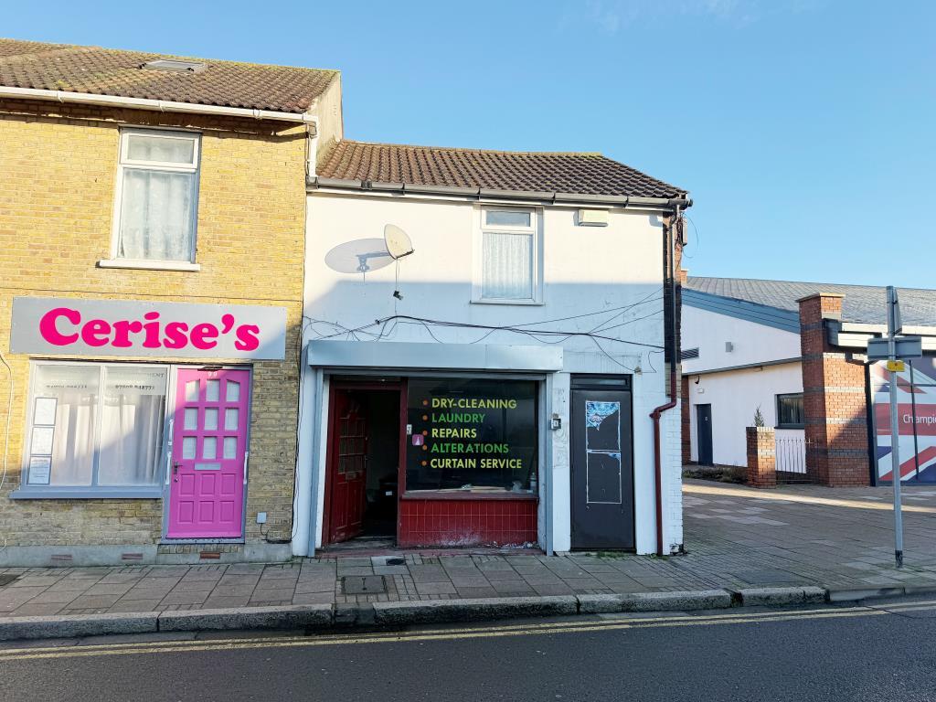 End-terrace property arranged as shop and flat