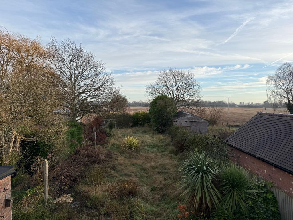View to the rear of the property towards farmland