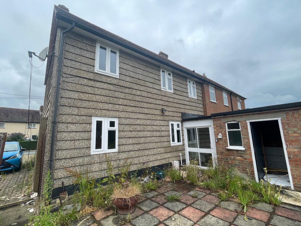 Rear elevation and storage shed to rear