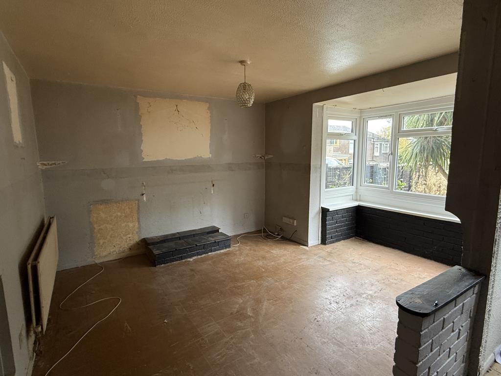 Living Room in house in need of refurbishment