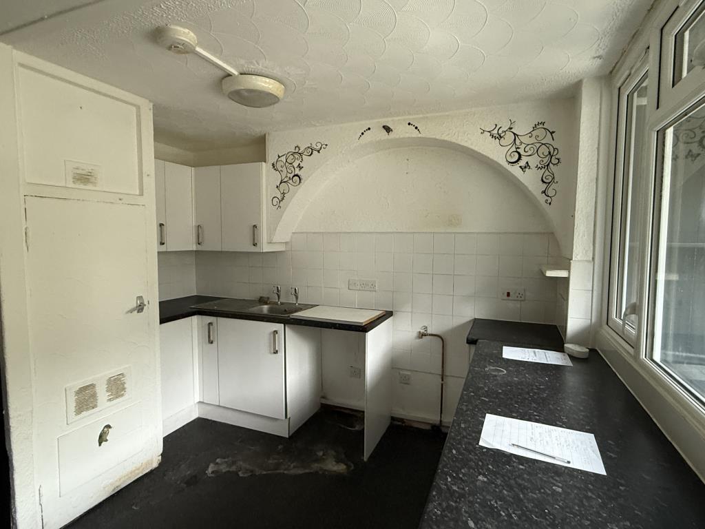 Kitchen in house in need of refurbishment
