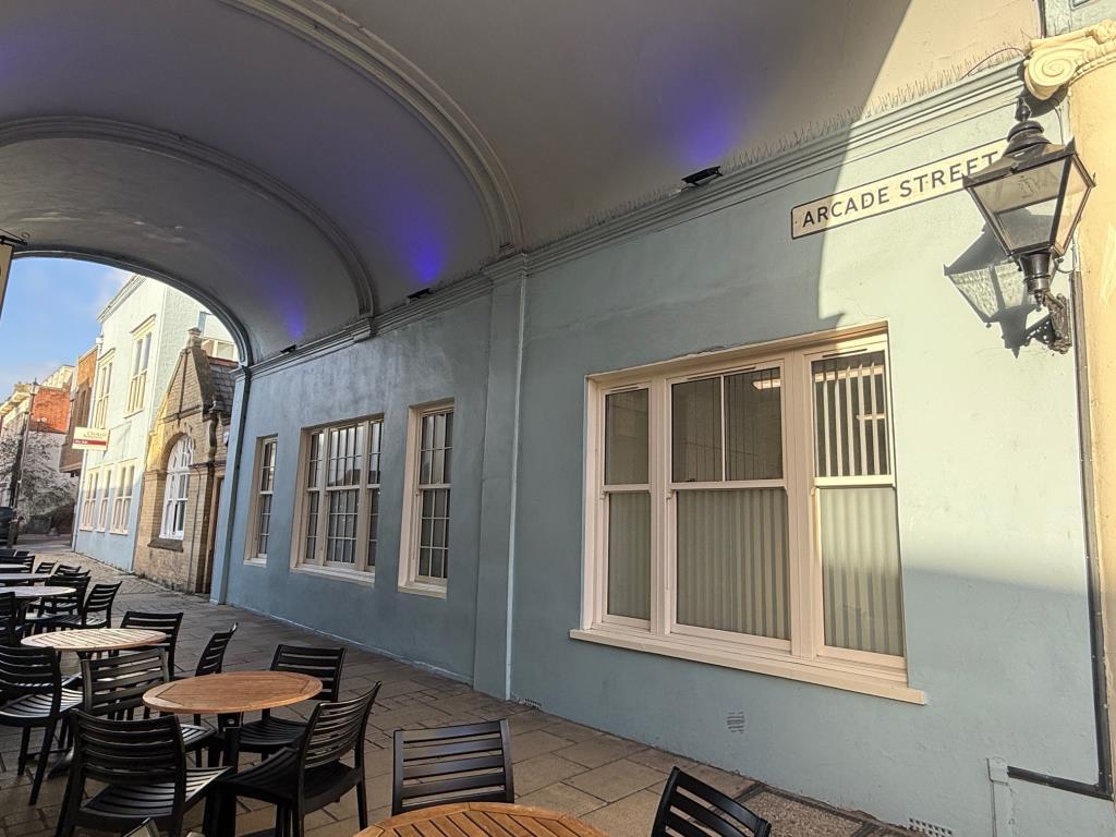 Side of the building looking under the archway