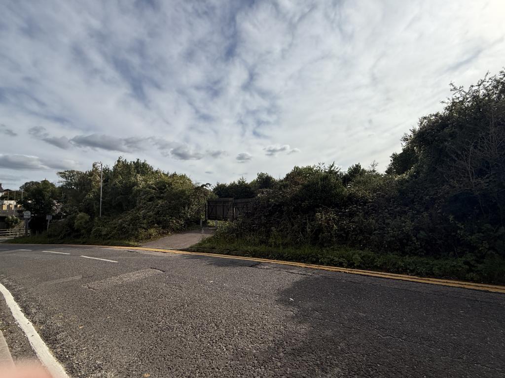 View Entrance to Site with Planning for Three Deta