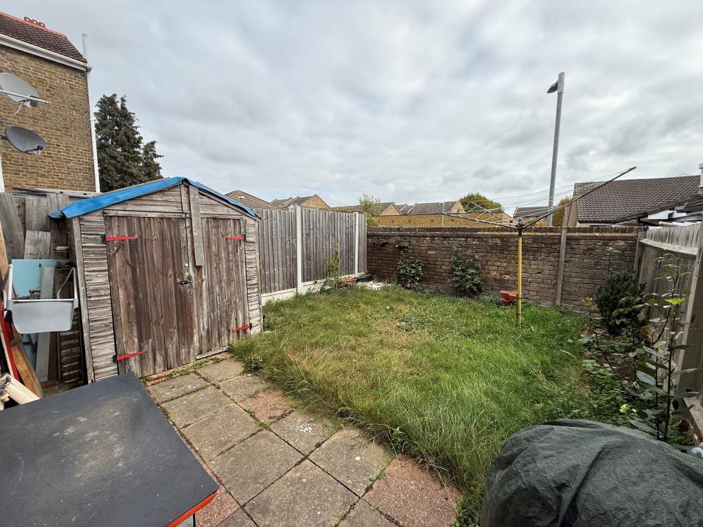 Garden with grass and patio