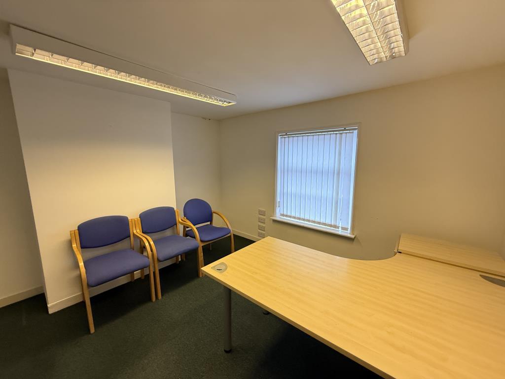 Second floor office room with carpets and painted