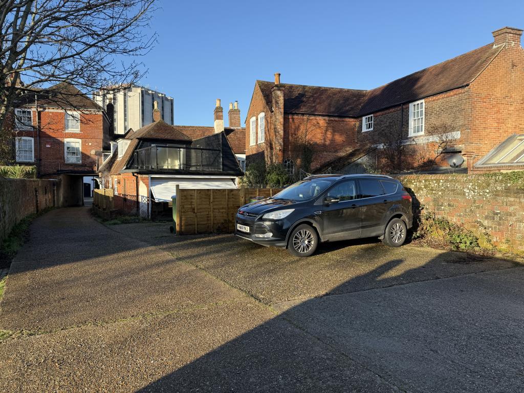 Parking area at rear of building
