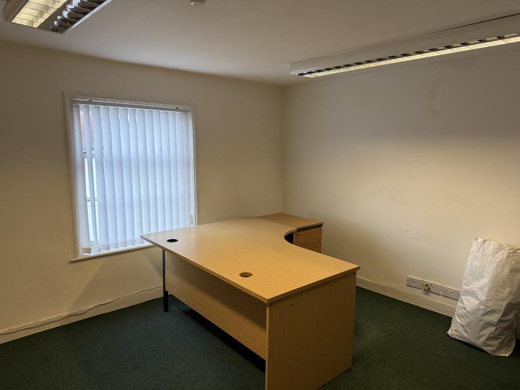Second floor office room with carpets and painted