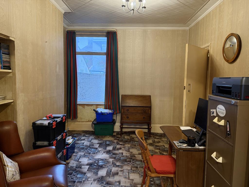 Living room with window to rear