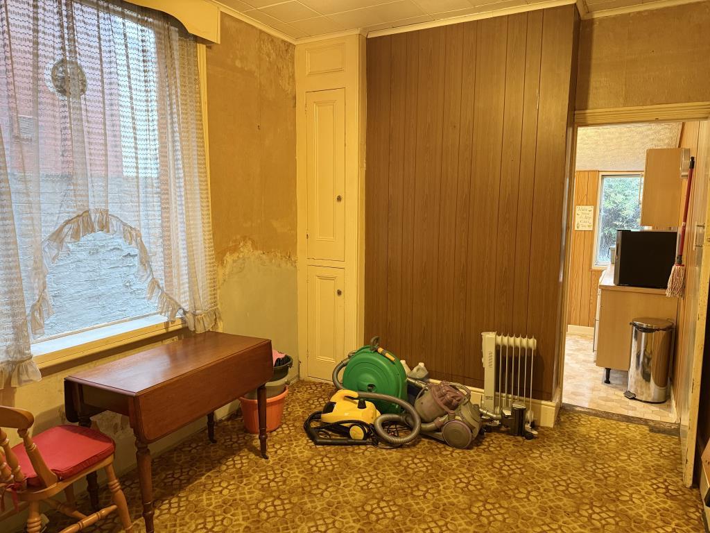 Dining room with view to kitchen