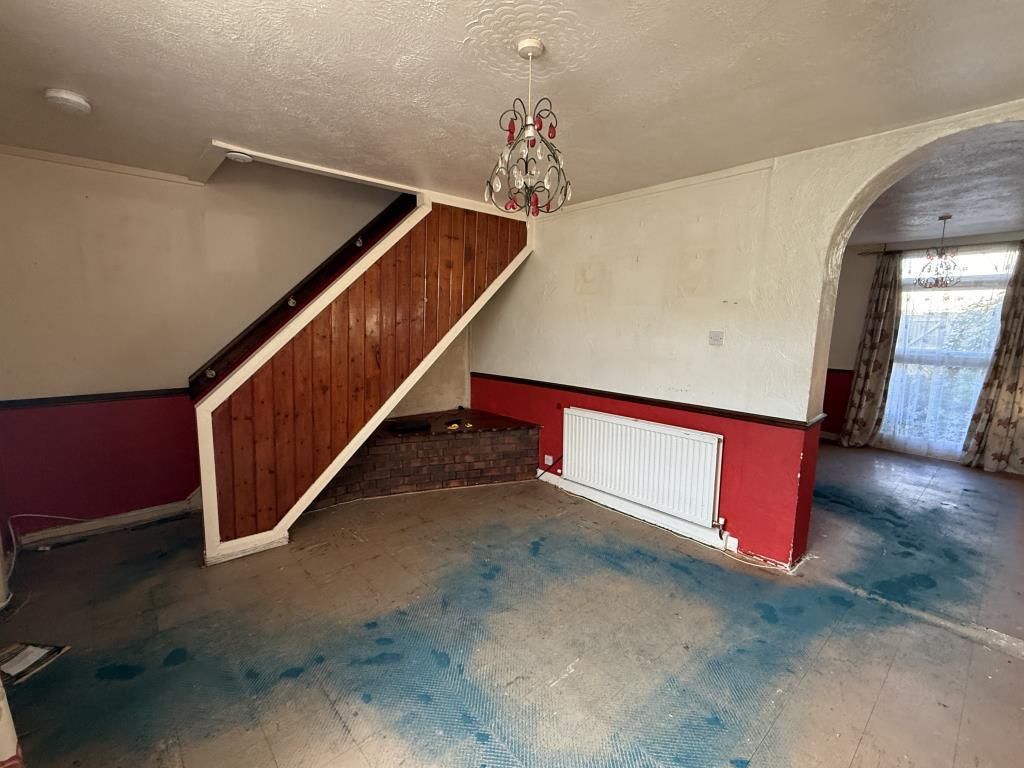 View of Living Room in House in Need of Improvemen