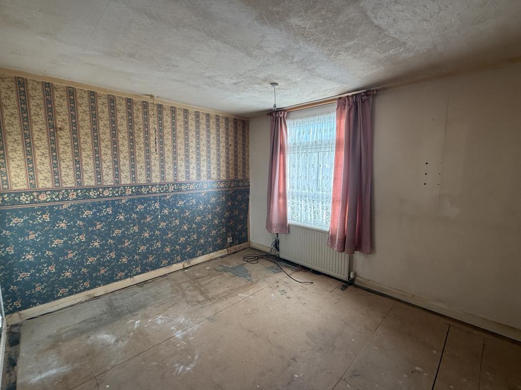 Bedroom 1 in House in Need of Improvement