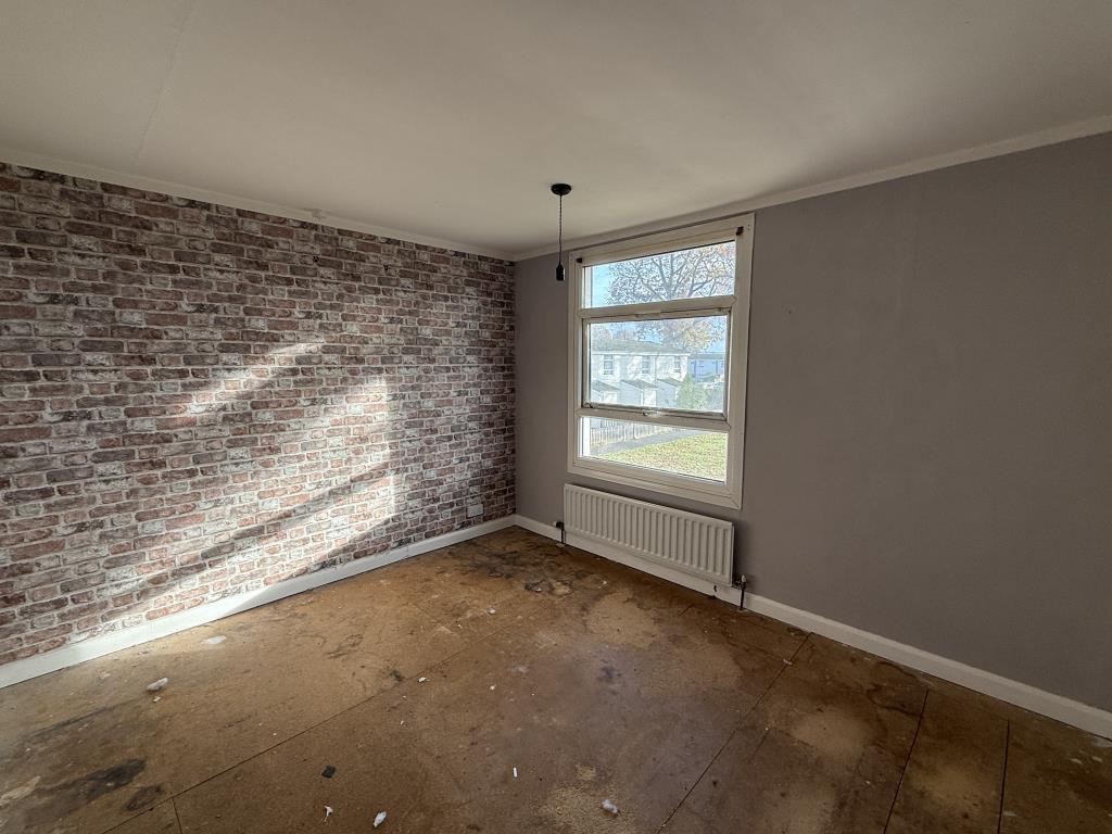 Bedroom 1 in House in Need of Improvement