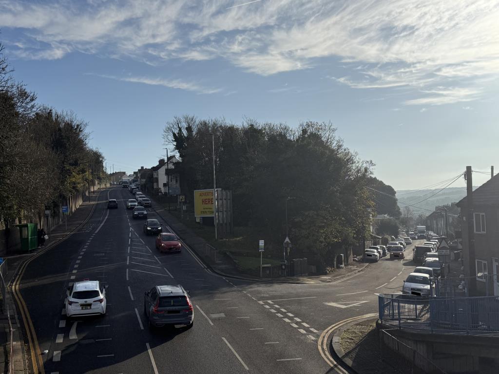 View from Footbridge of land with Advertising Hoar