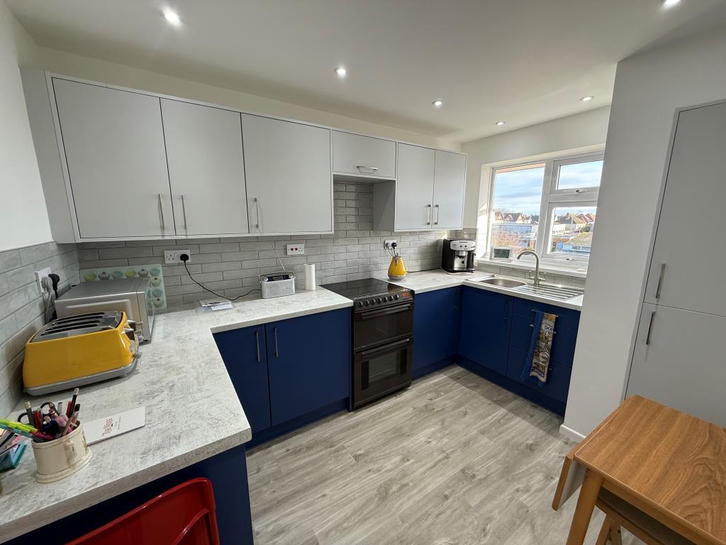 Refurbished kitchen with integrated appliances