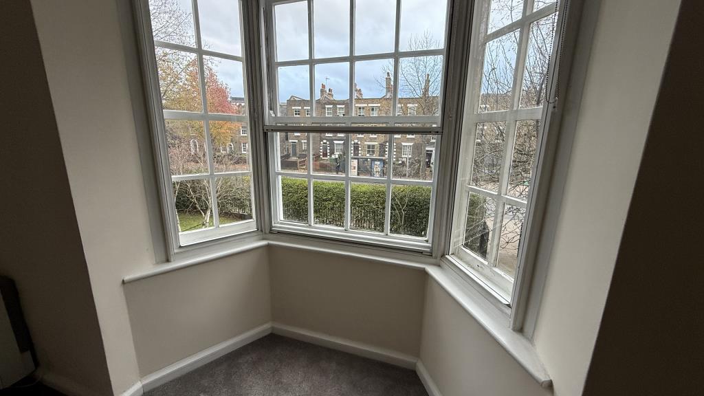 Internal image of bay window overlooking main road