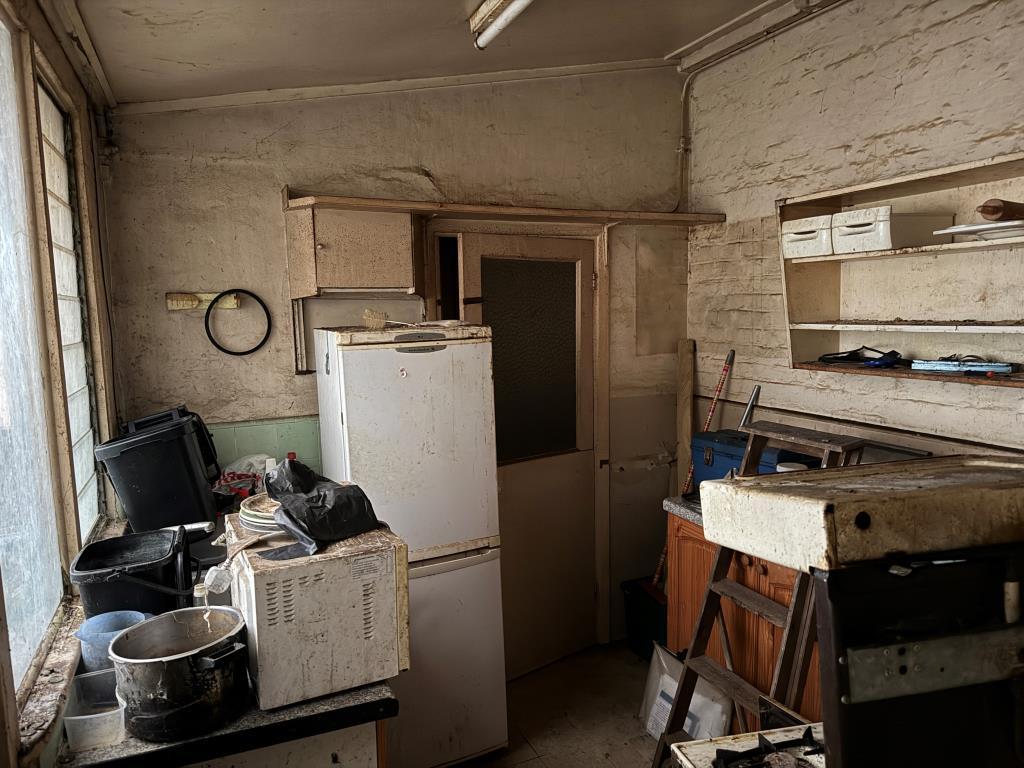 View of kitchen with door to bathroom &amp; WC