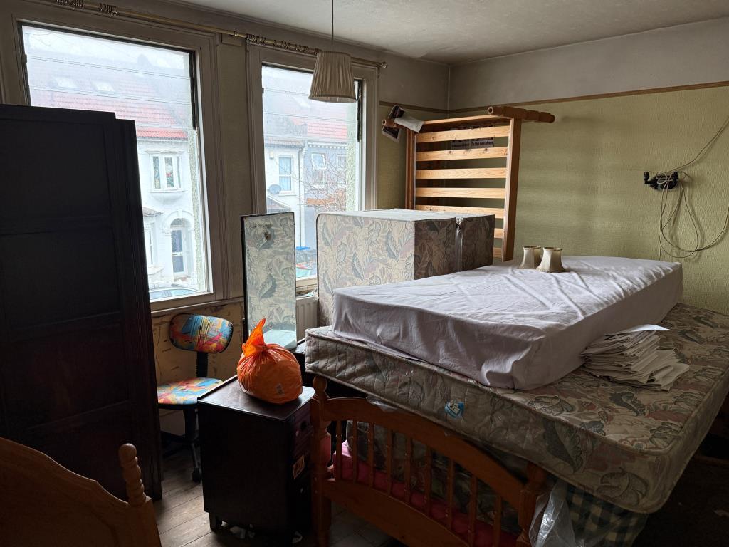 Front bedroom with view of road on first floor