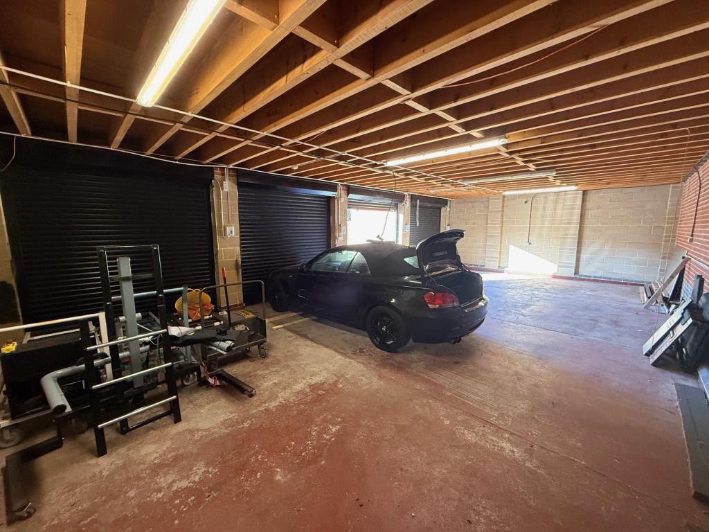 Open plan garages inside showing the depth and hei