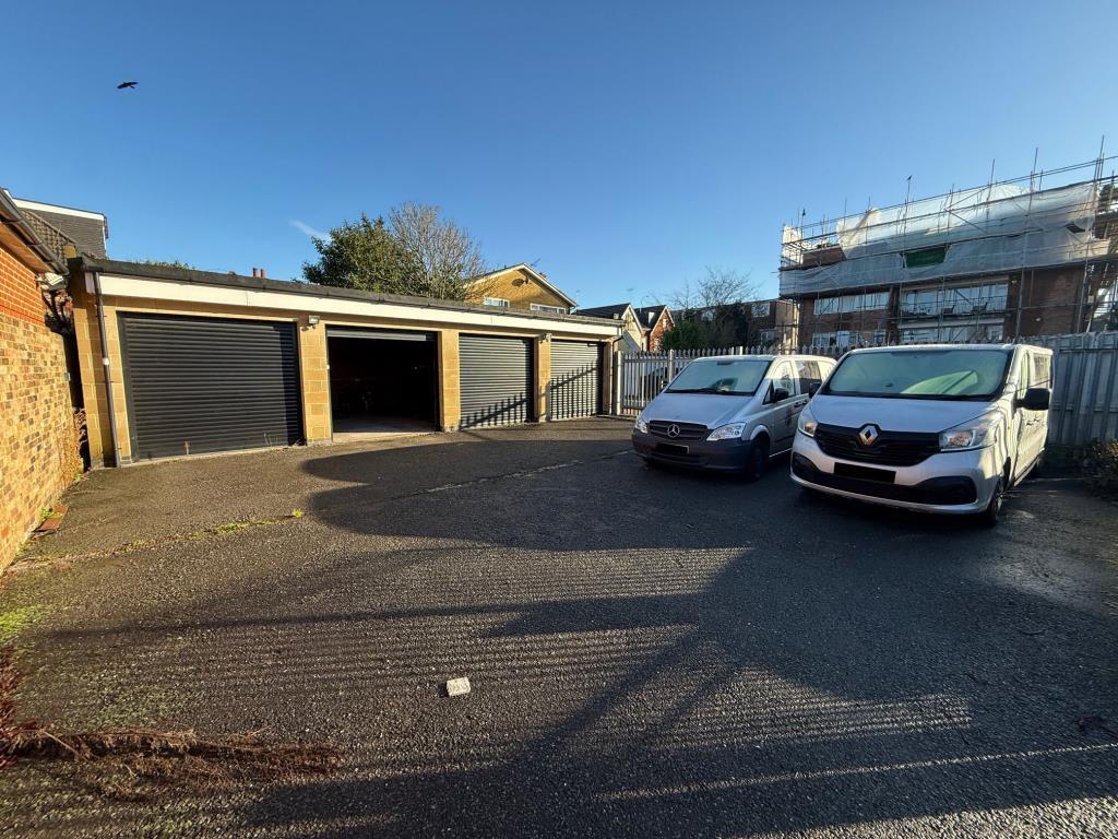Garages and forecourt taken from just inside the g