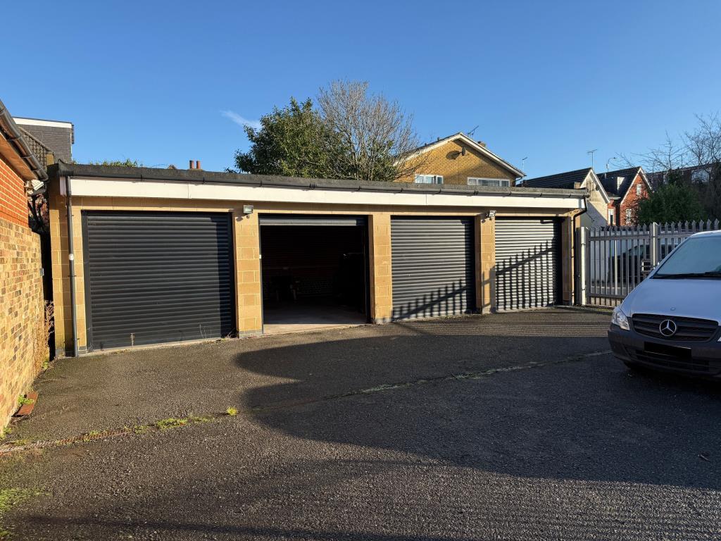 Garages with one shutter open