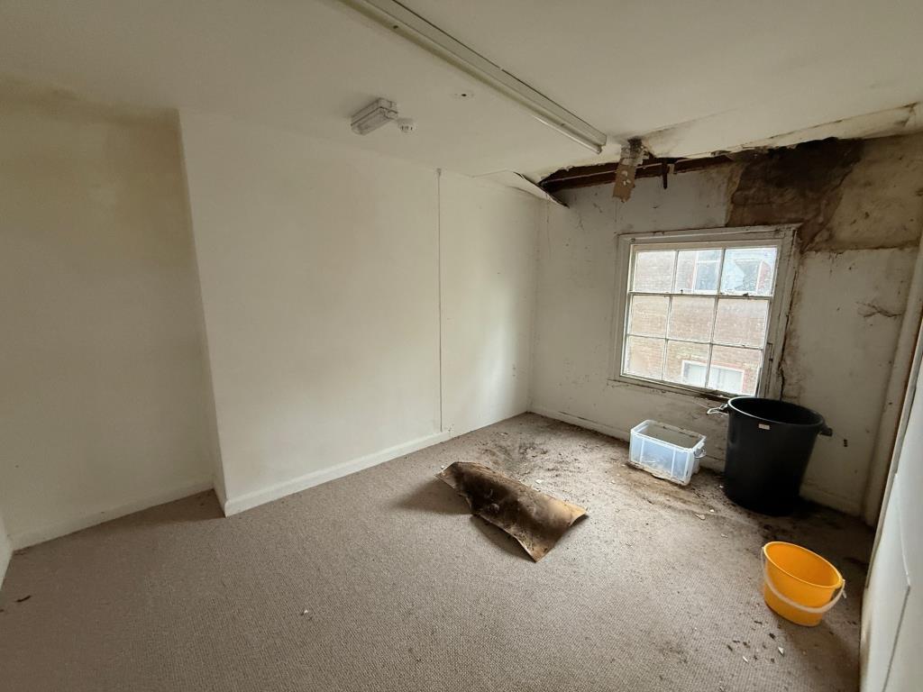 Second floor room with ceiling damage