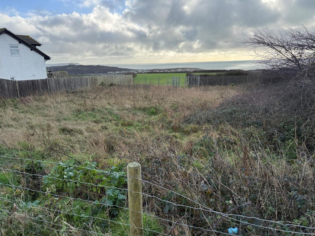Land with planning and sea views