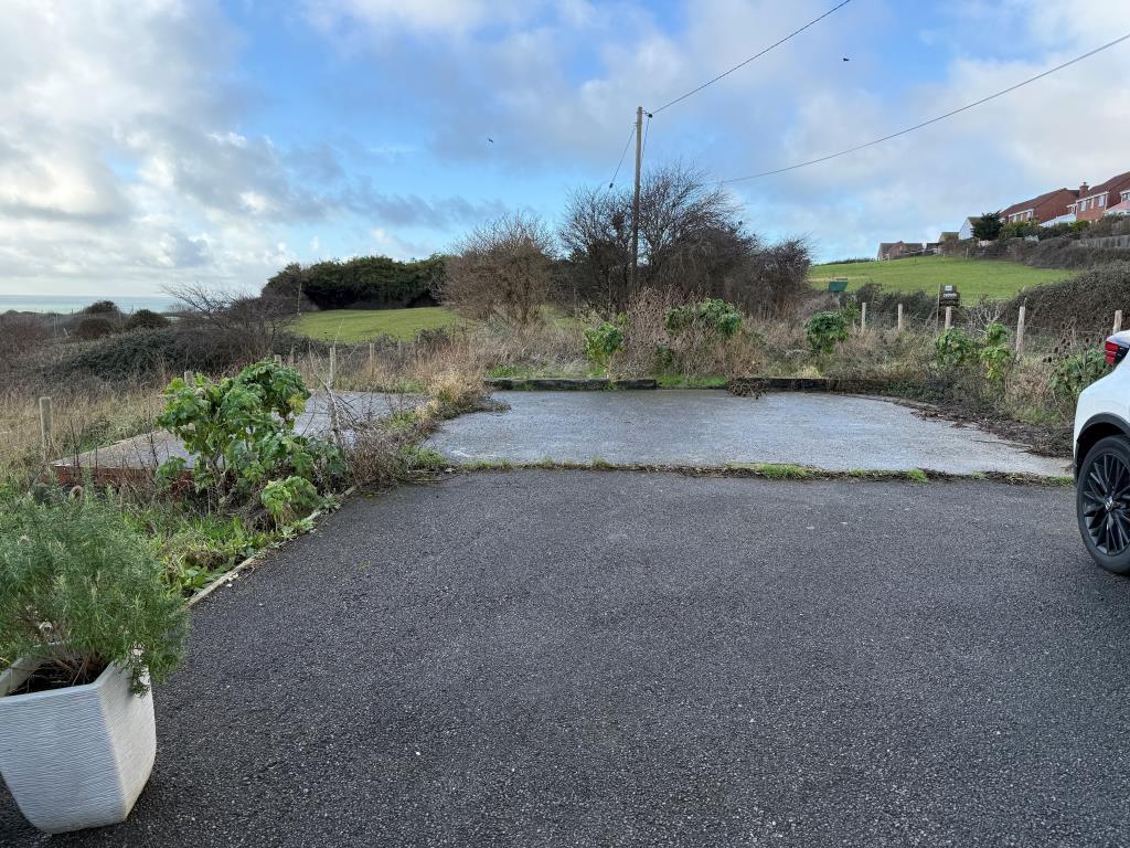 Land with parking and driveway