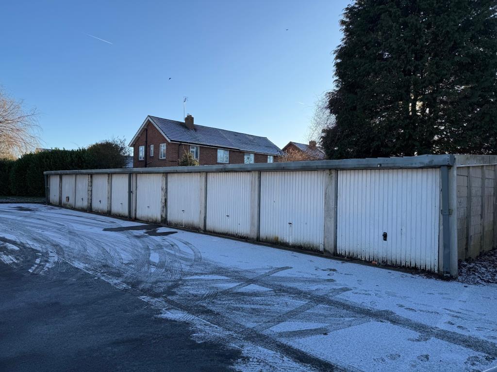Reverse angle of ten lock up garages