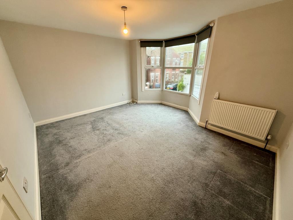 Bedroom one with bay window
