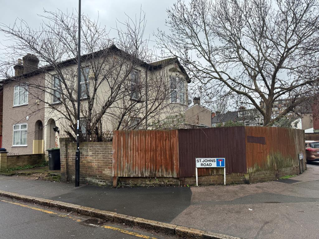 View of front and side of house from road