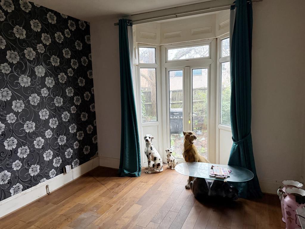 Living room with doors to garden