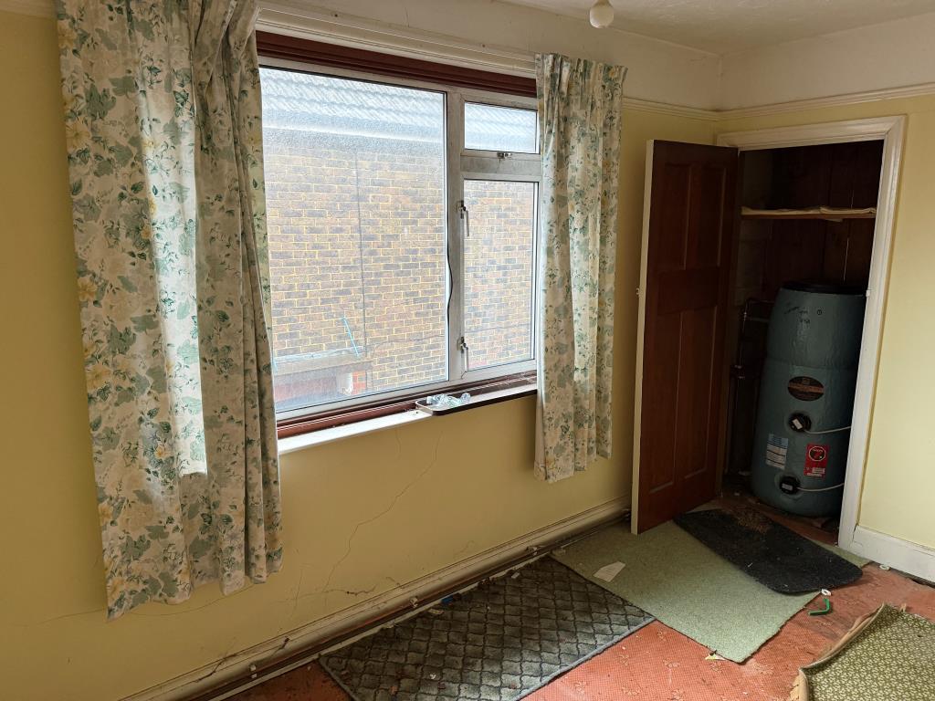 Main bedroom with view over side access