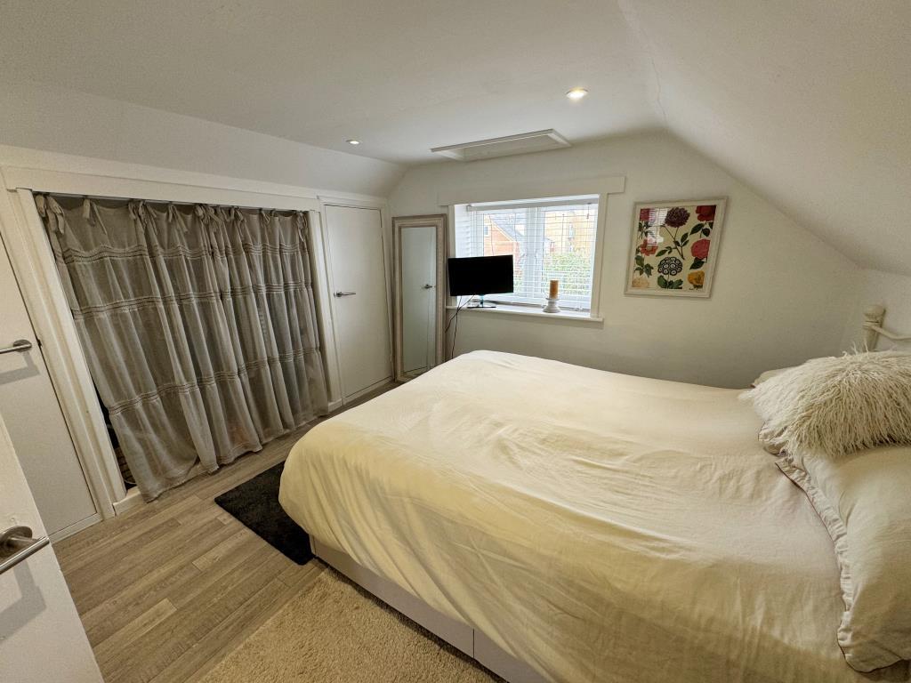 Second floor bedroom with built in storage
