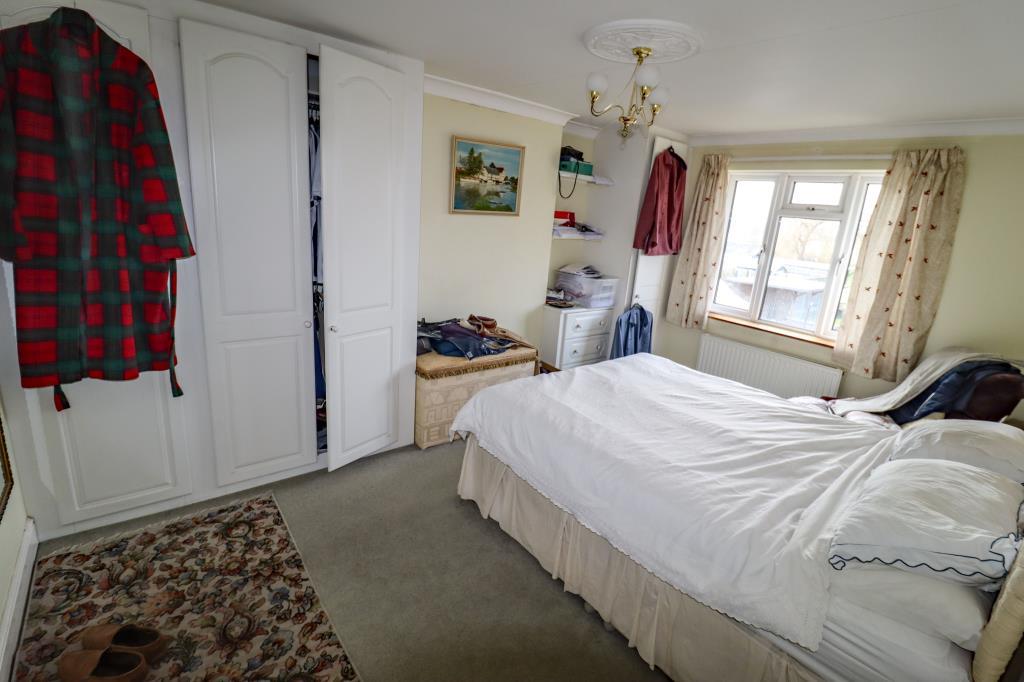 First floor bedroom at rear of building