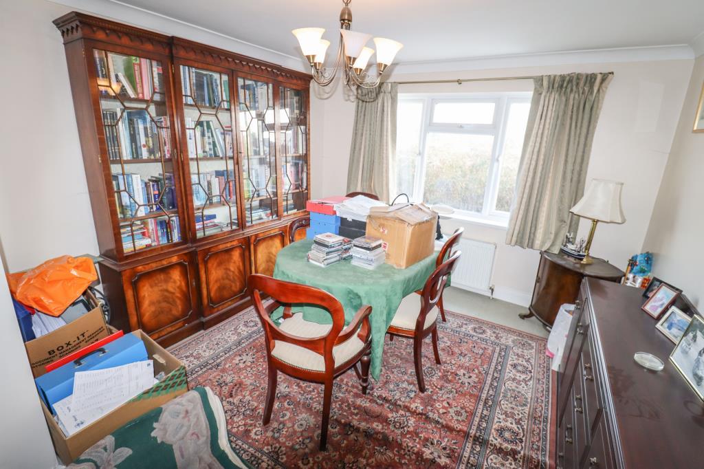 Bedroom three currently arranged as a dining room