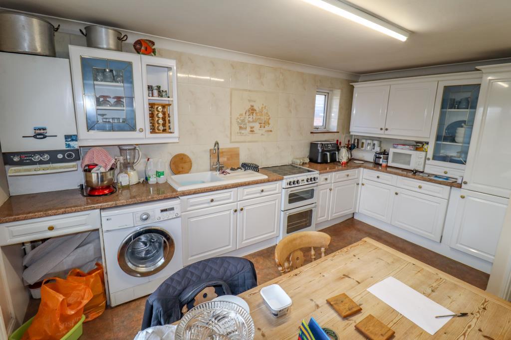 Kitchen in flat with fitted units